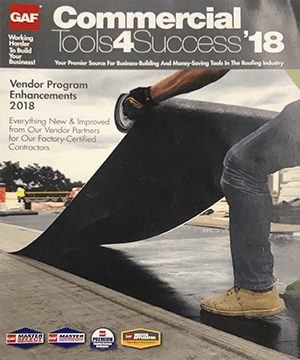 Person unrolling a sheet of roofing material on a flat rooftop; text promotes the GAF Commercial Tools4Success’18 event and vendor program enhancements for contractors.
